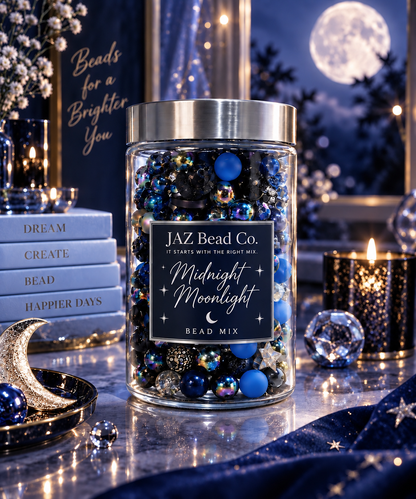 JAZ Bead Co. Midnight Moonlight bead mix in a clear jar, featuring deep blue, black, iridescent and silver beads with moon and star accents in a moonlit setting.